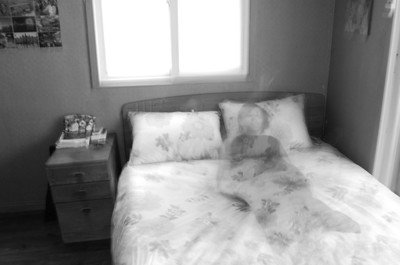 Poltergeist as an apparition on the bed