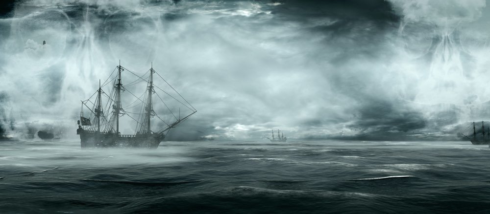 Ghost ship on misty, mysterious stormy sea