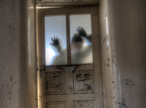 Ghost silhouette through the door