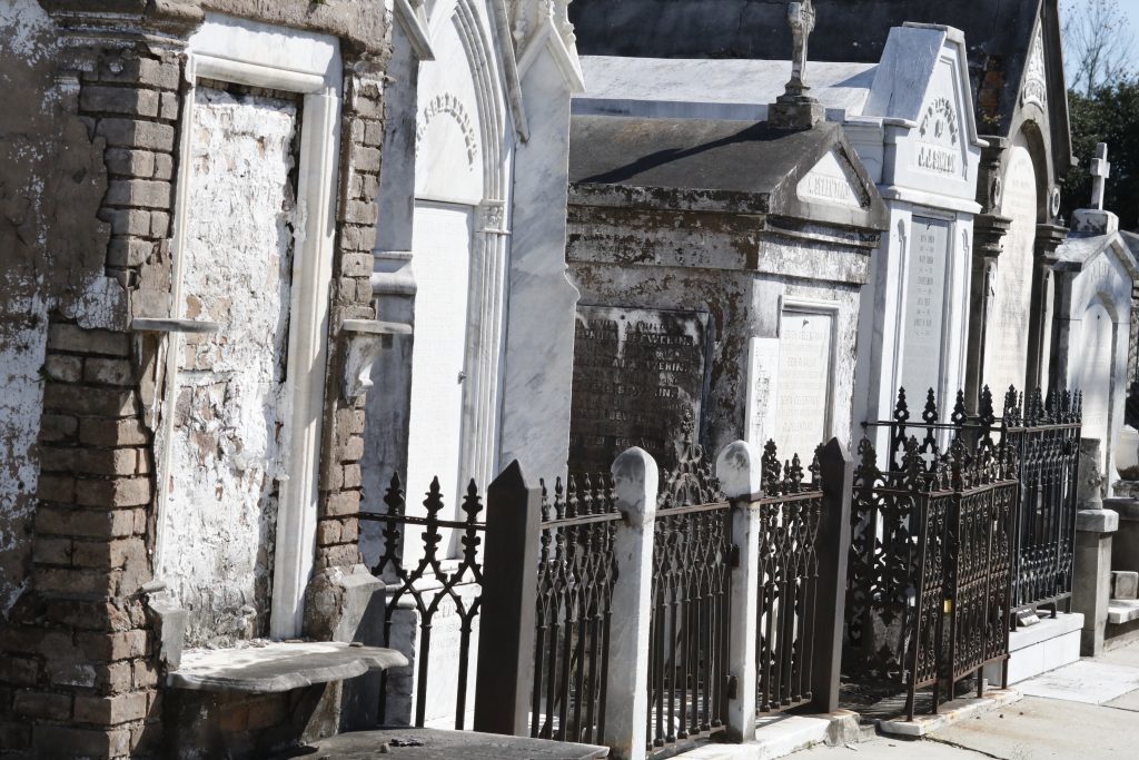 Lafayette Cemetery 2 Puzzle Box Horror images graves row of tombs and fence