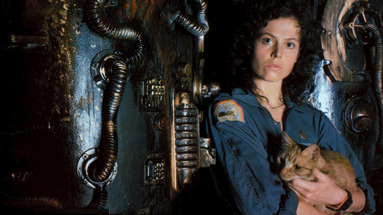 Ripley from alien movie holding a cat