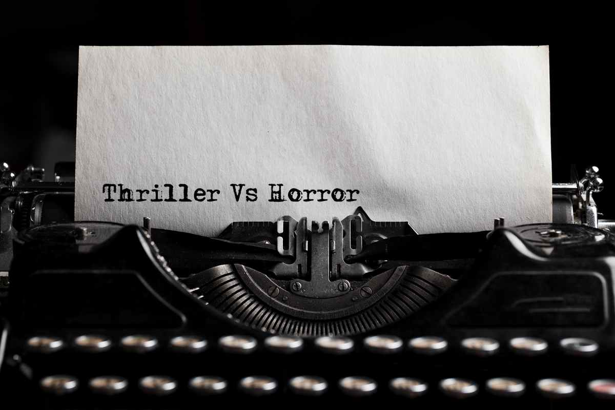 Thriller Vs Horror type writer on paper