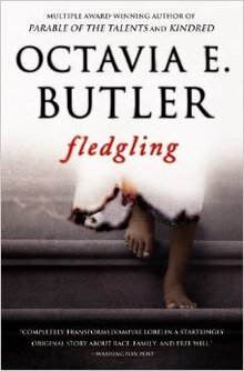 Fledgling scary novel cover with legs coming out of a white wall