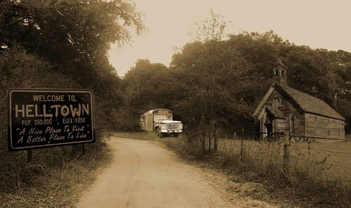 Helltown Ohio with welcome sign, school bus and old church
