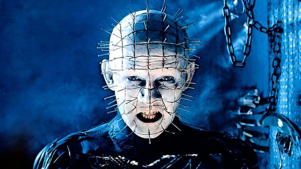 clive barkers pinhead character showing demon with pins in his face and head