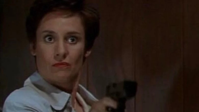 Scream 2 killer Mrs Loomis aka Debbie Salt shown holding a gun
