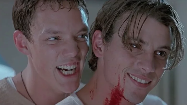 Original Scream Killers Billy Loomis and Stu Macher seen talking with blood on their shirts and face