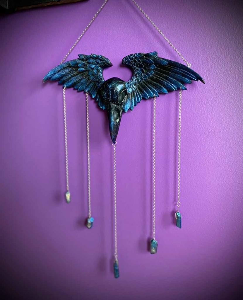 Raven skull wall art with hanging crystals