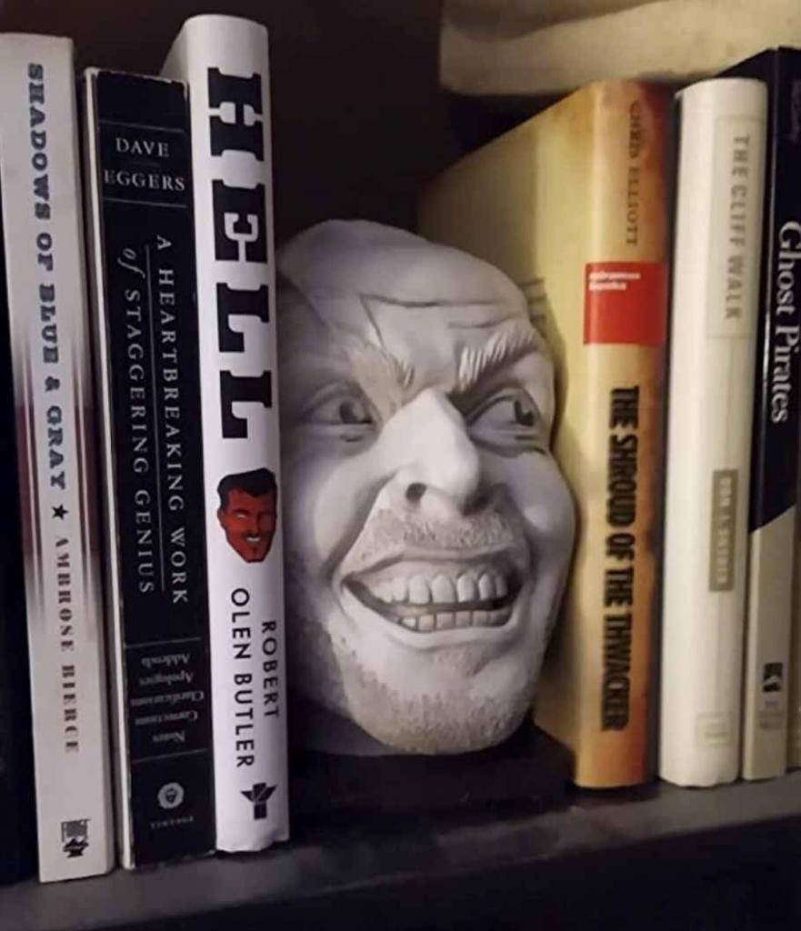 Shinning book shelf model featuring a molded head between books