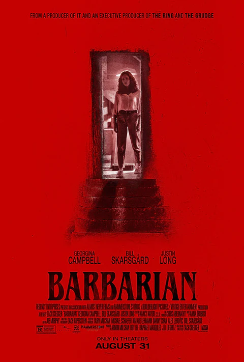 Barbarian horror movie poster featuring a woman looking through a scary doorway